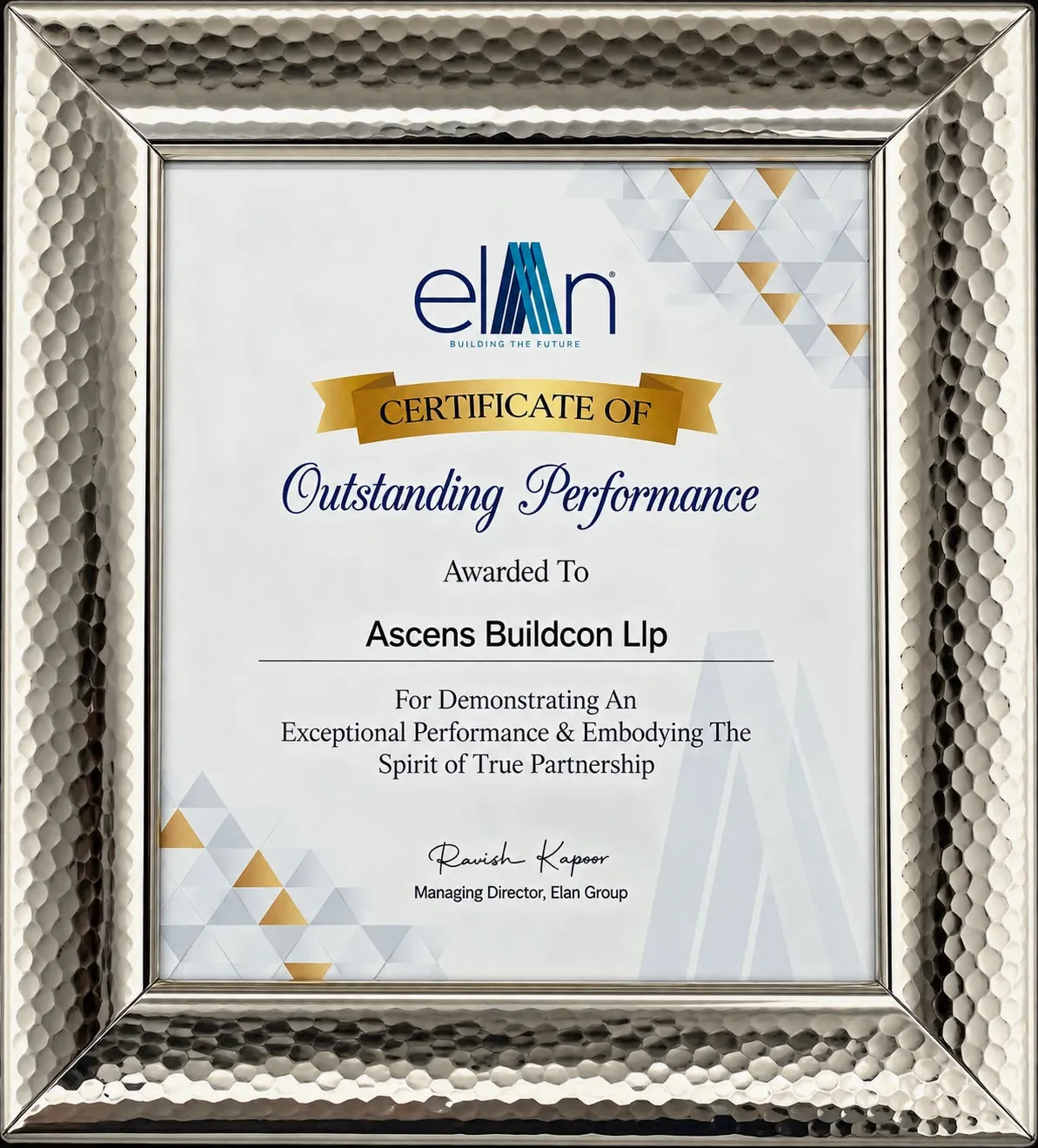 Silver-framed Elan Group certificate of outstanding performance awarded to Ascens Buildcon LLP.