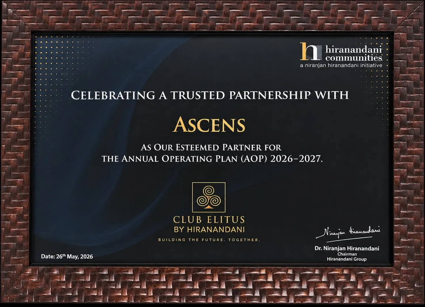 Framed Hiranandani Communities plaque naming Ascens an esteemed partner for the Club Elitus annual operating plan 2026–2027.
