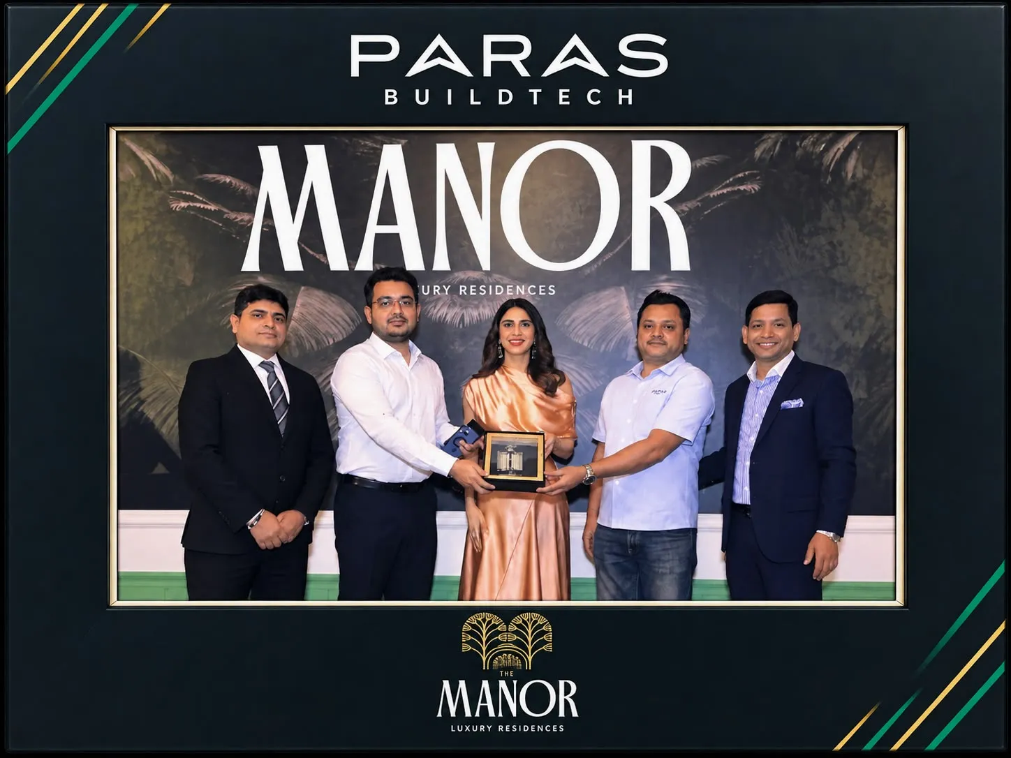 Commemorative Paras Buildtech Manor panel showing the Ascens team receiving their award on stage.