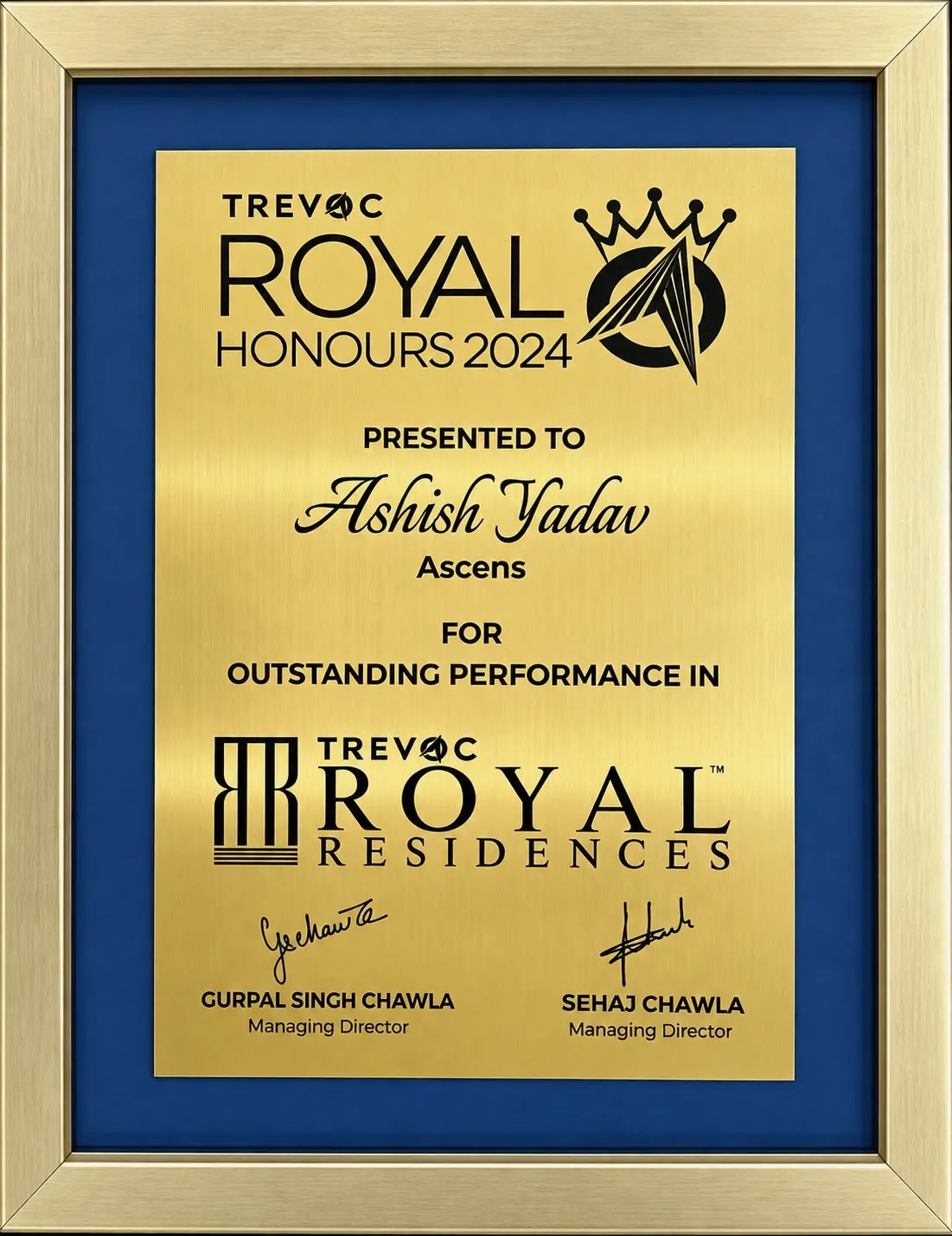 Gold and blue TREVOC Royal Honours 2024 plaque presented to Ashish Yadav of Ascens for outstanding performance.