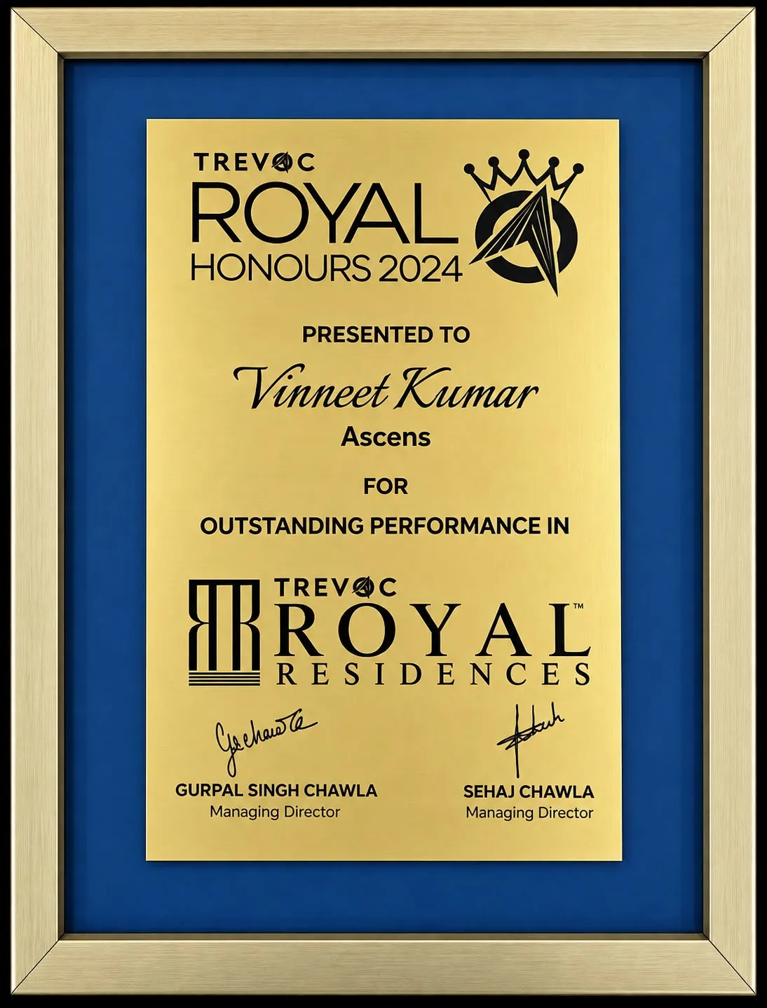 Gold and blue TREVOC Royal Honours 2024 plaque presented to Vinneet Kumar of Ascens for outstanding performance.